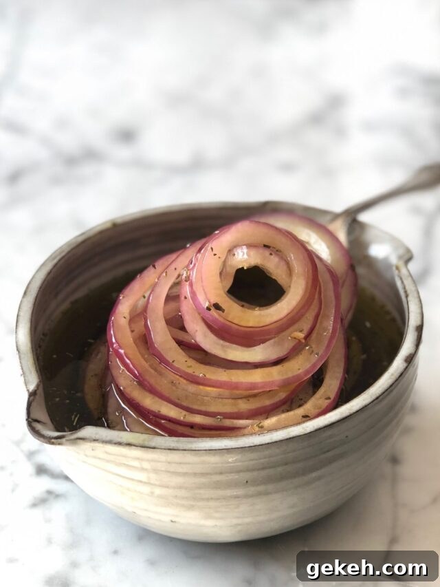 Marinated Onions in a white bowl