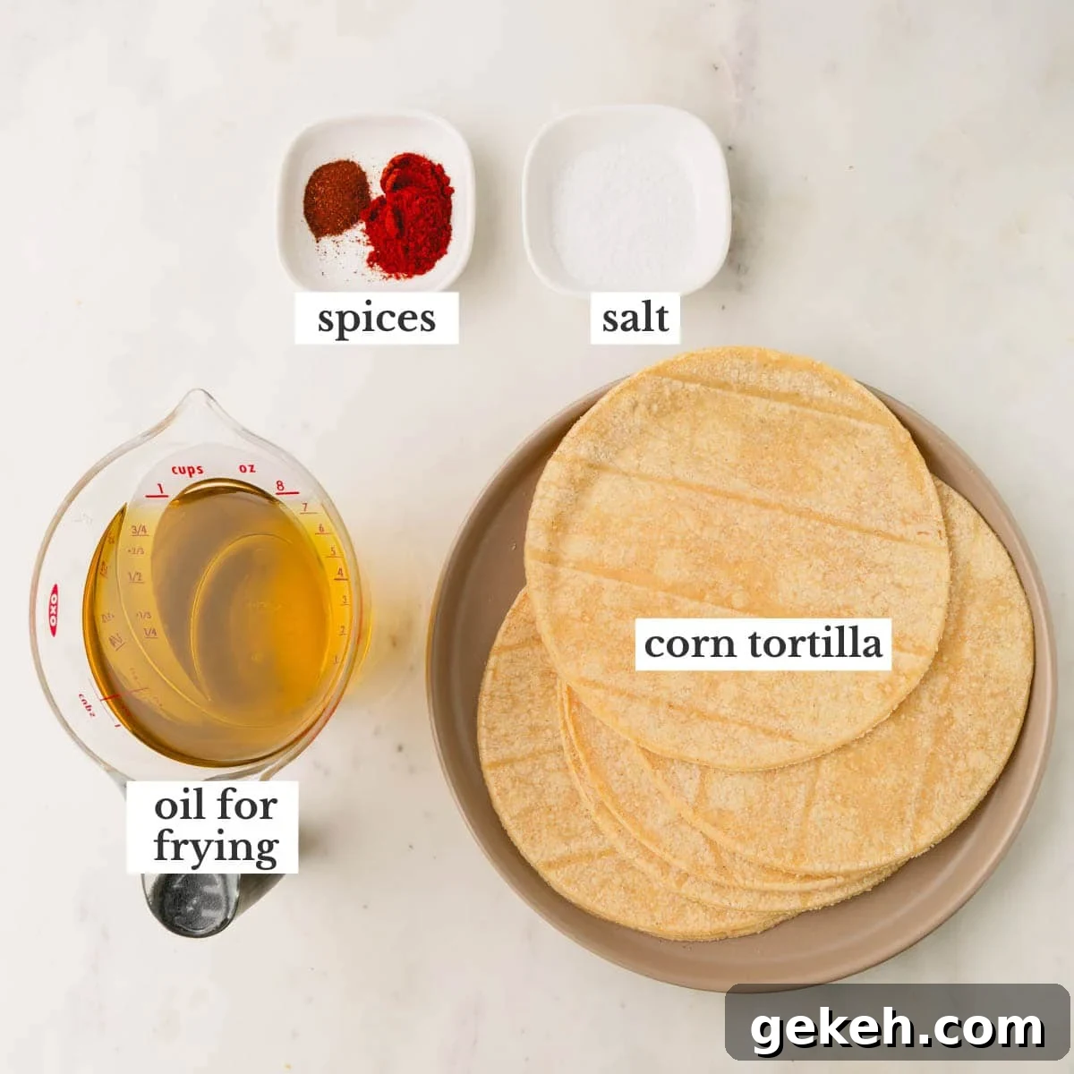 Spices, salt, corn tortillas, and oil to make spicy tortilla chips.