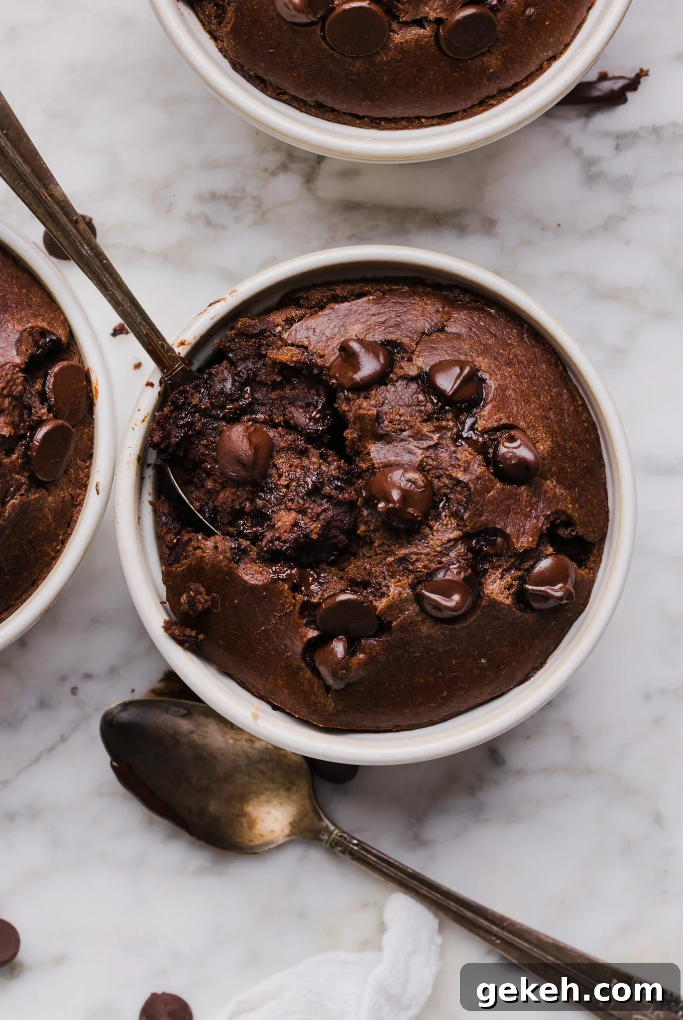Chocolate baked oats in a white ramekin.