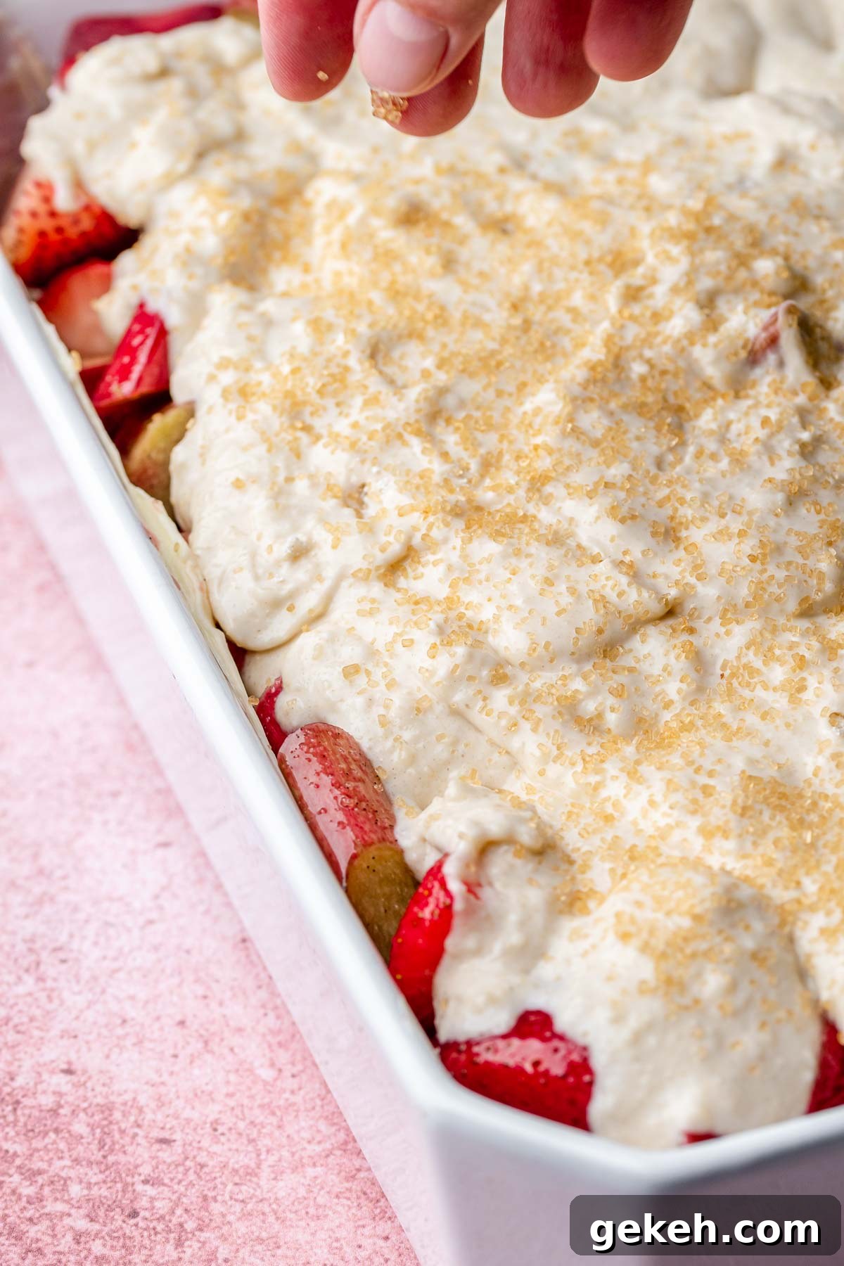 Strawberry Rhubarb Cobbler Recipe: Classic Summer Dessert 8 Coarse sugar is sprinkled on top of bisquick batter before baking.