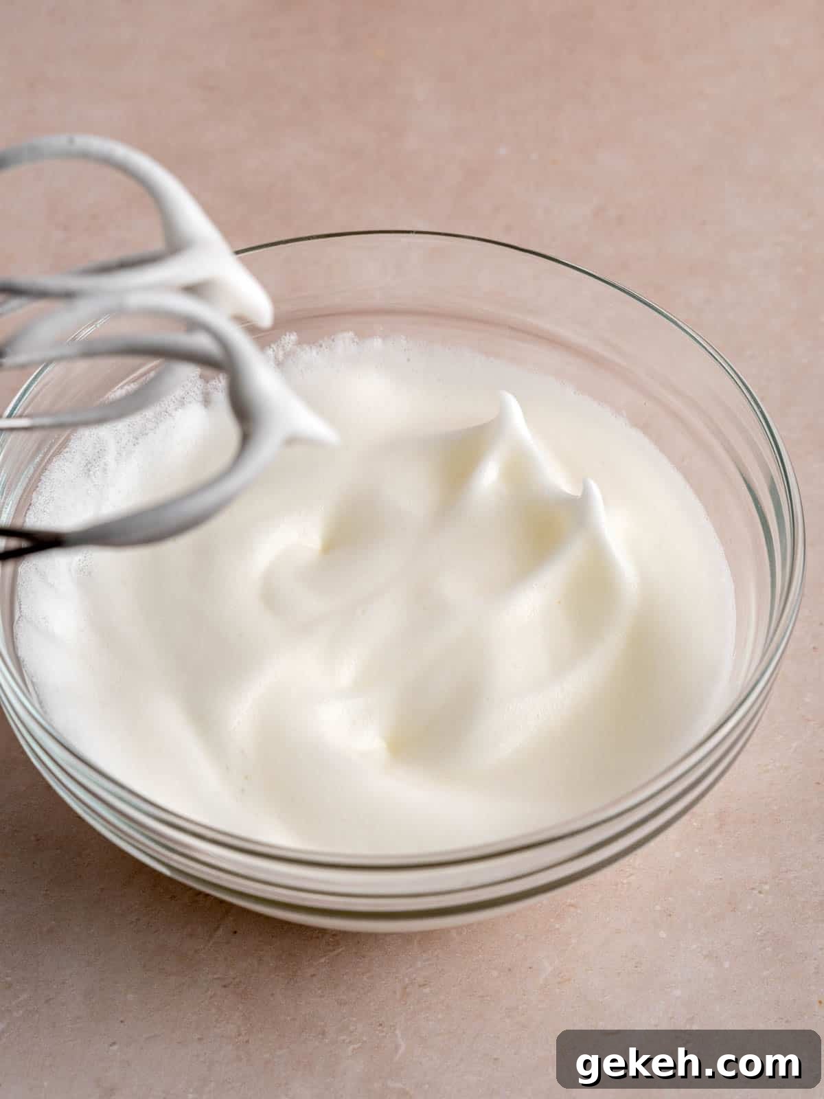 Homemade Almond Cream Cake Recipe for Moist, Decadent Slices 5 Egg whites whipped to stiff peaks.