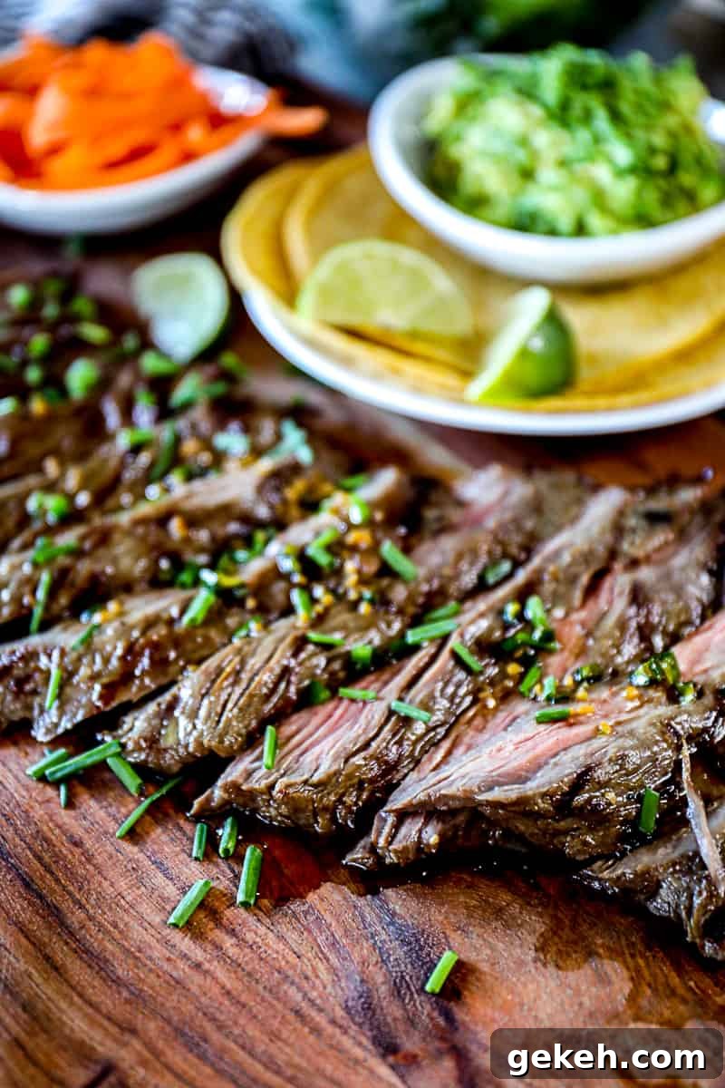 Image of marinated steak with taco ingredients.