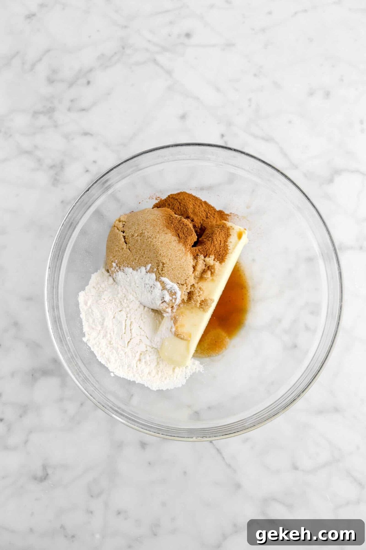 butter, brown sugar, pumpkin pie spice, salt, and vanilla in glass bowl