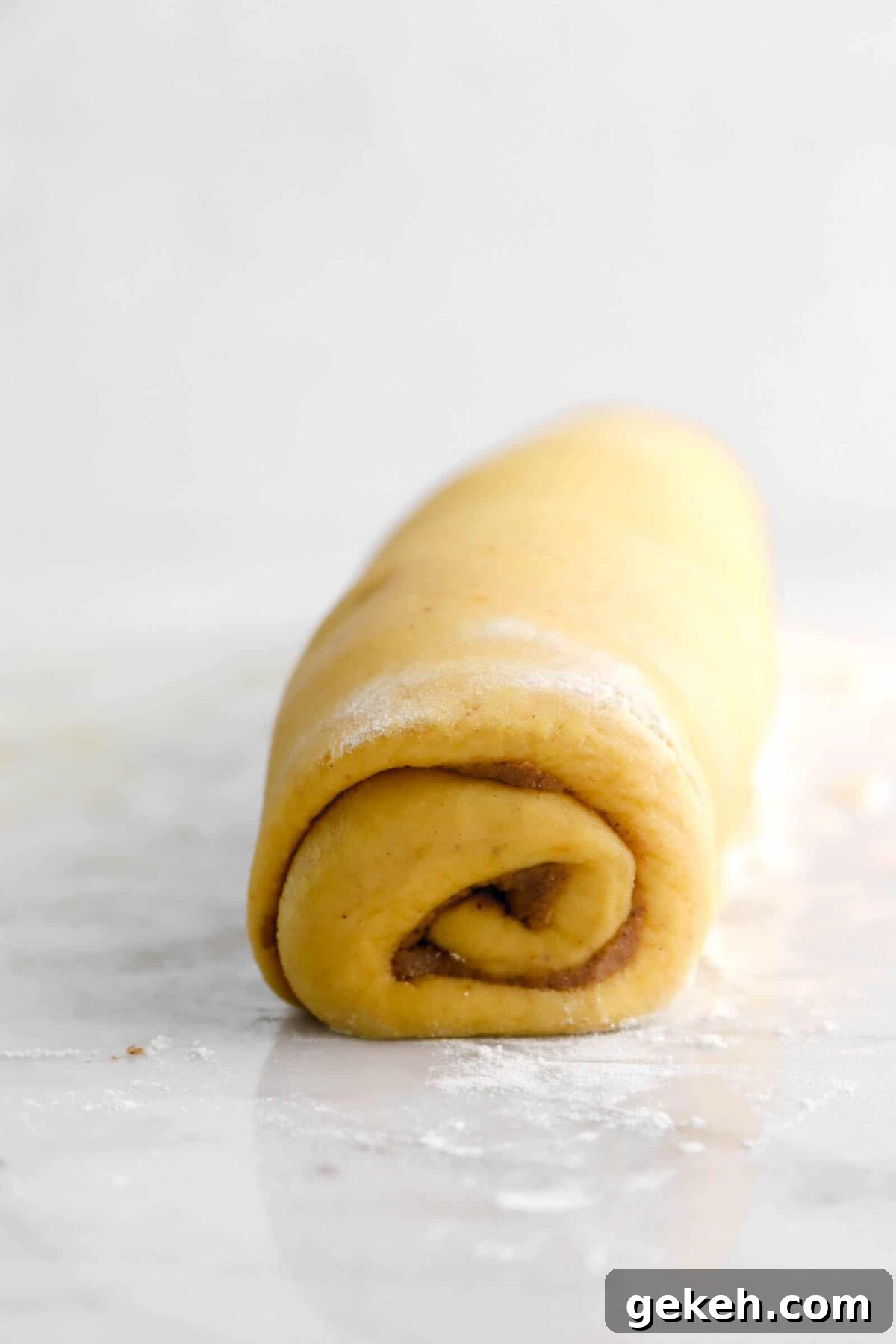 dough rolled on marble counter