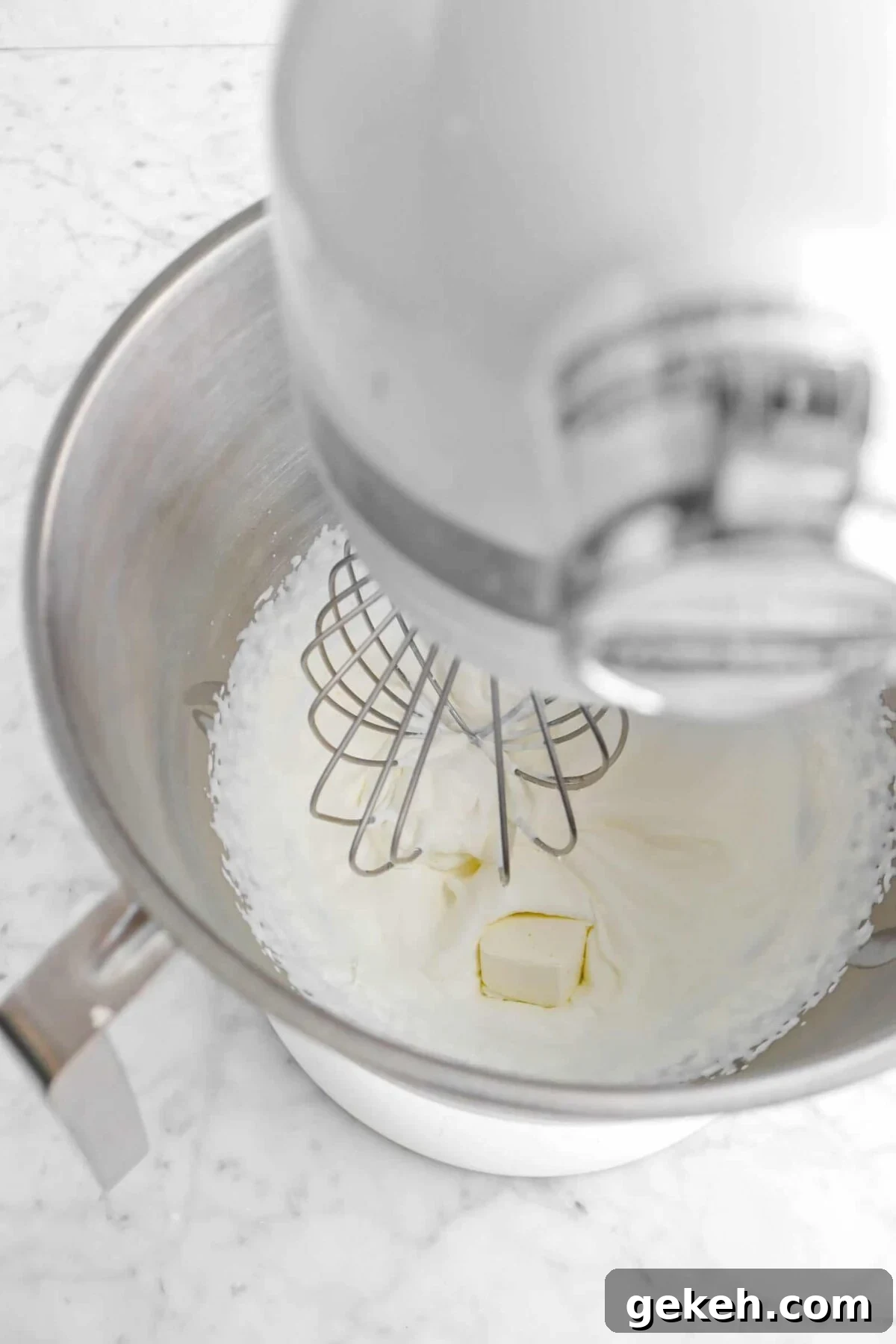 cream cheese cube added to whipped cream