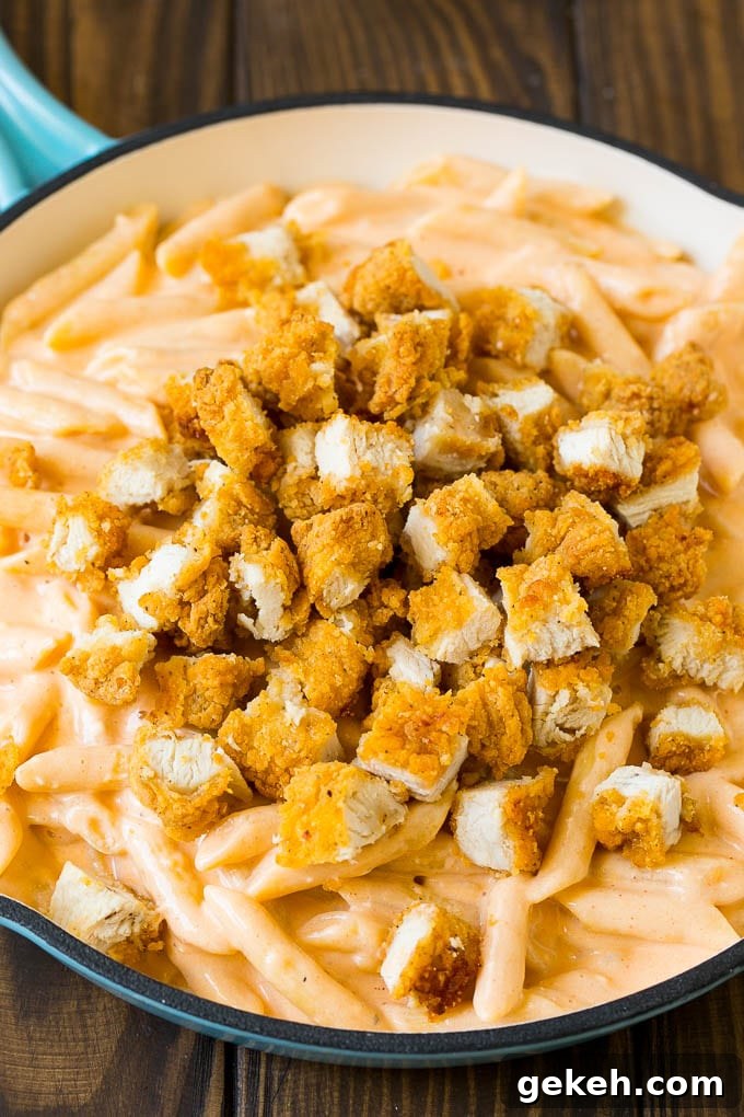 Buffalo Chicken Pasta Recipe | Baked Pasta #chicken #buffalochicken #pasta #cheese #dinner #dinneratthezoo Chopped chicken tenders on top of cheesy pasta.