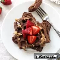 Chocolate Whole Wheat Waffles Recipe — Fluffy Cocoa Waffle Guide 2 Perfectly light and fluffy chocolate whole wheat waffles! Easy, wholesome and a fantastic make-ahead breakfast! Just reheat in the toaster and go!
