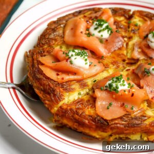 Smoked Salmon and Honey Rösti Recipe for Brunch 4 A appetizer recipe for a rosti with smoked salmon, creme friache and chives on top.
