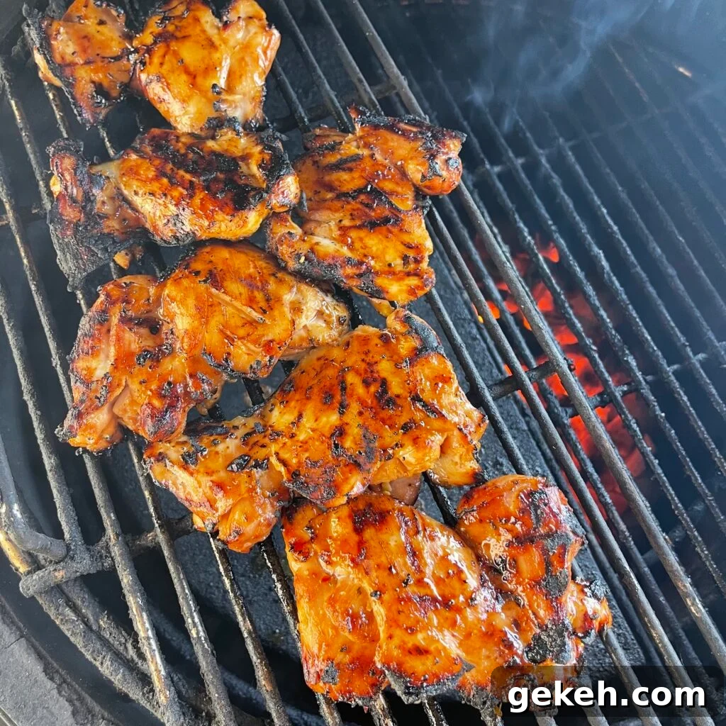 Thai-Style Grilled Chicken with Tangy Marinade 7 chicken thighs on the grill.