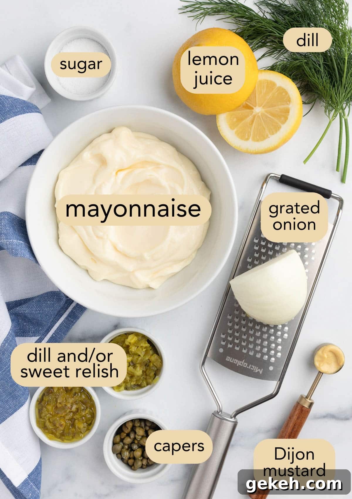 ingredients needed to make homemade tartar sauce in bowls on a marble board with text overlays of ingredient names