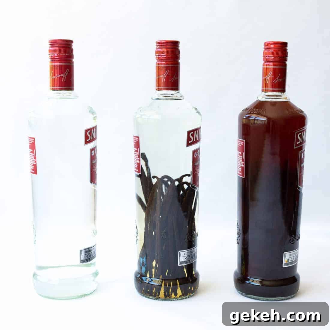 Homemade Vanilla Extract Infused with Rum: Step-by-Step Guide 9 Three Smirnoff bottles, one with plain vodka, one with vanilla beans added, and one after the homemade vanilla extract has steeped.