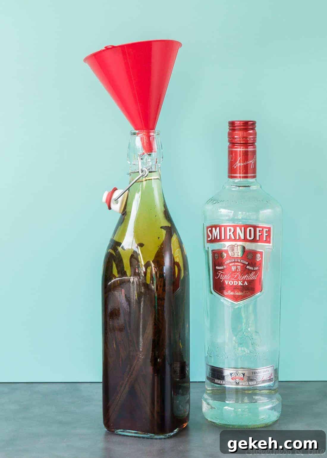 Homemade Vanilla Extract Infused with Rum: Step-by-Step Guide 7 The bottle with vanilla beans, rum and vodka poured in to the top.