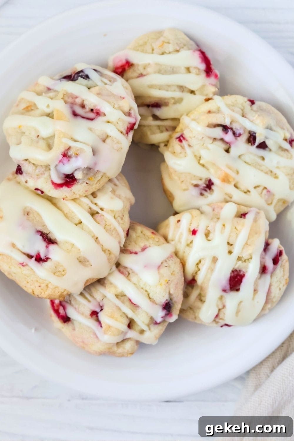 overhead view of a plate of cake mix cranberry orange cookies made with fresh cranberries.