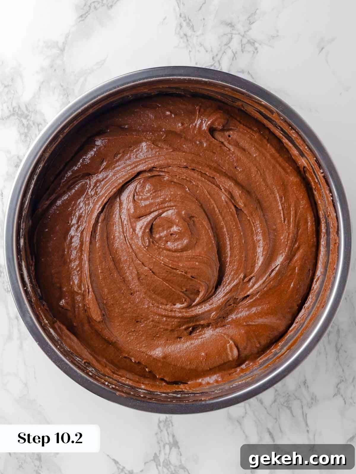 Decadent Guinness Chocolate Cake Recipe with Rich Stout Frosting 10 folding chocolate ganache mixture into cake batter.