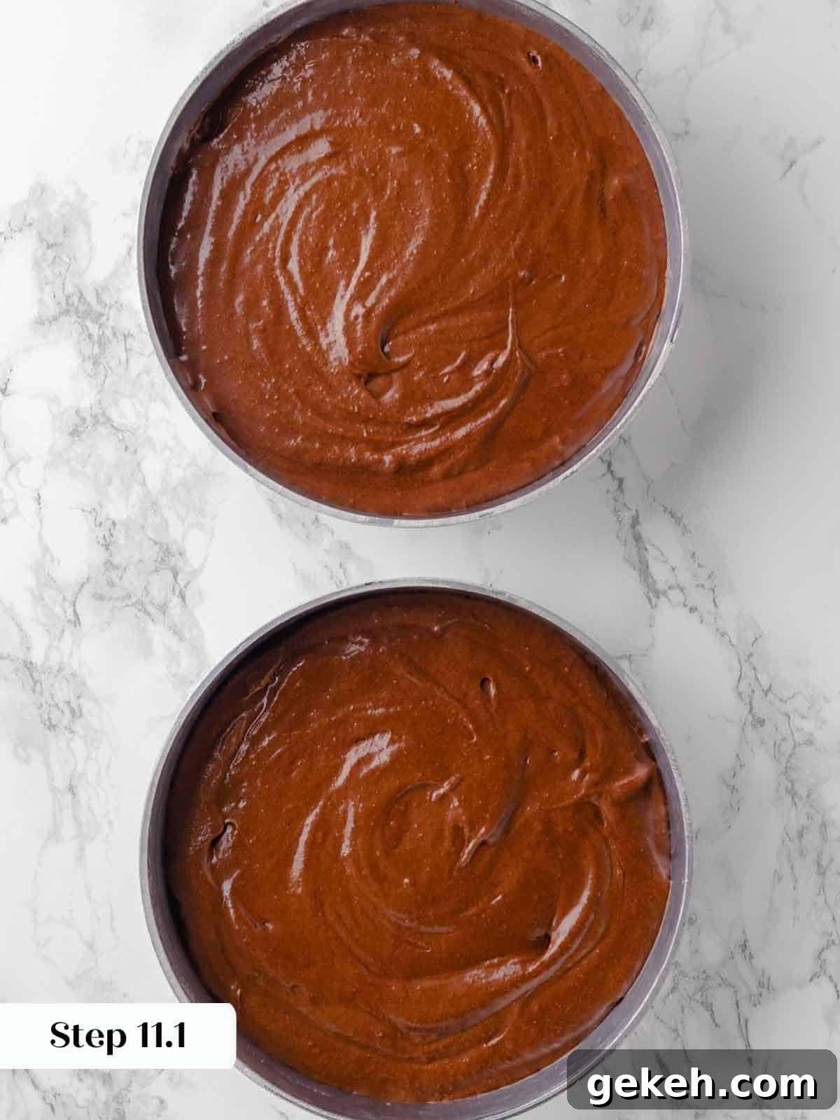 Decadent Guinness Chocolate Cake Recipe with Rich Stout Frosting 11 guinness chocolate cake batter divided between two prepared pans.