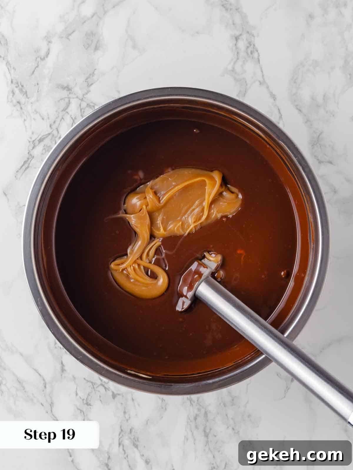 Decadent Guinness Chocolate Cake Recipe with Rich Stout Frosting 16 adding salted caramel sauce to hot ganache for frosting.