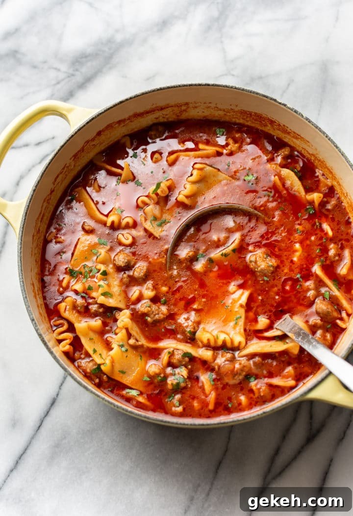 Lasagna Soup Recipe: Comforting Italian-Flavored One-Pot Meal 6 lasagna soup in a yellow pot