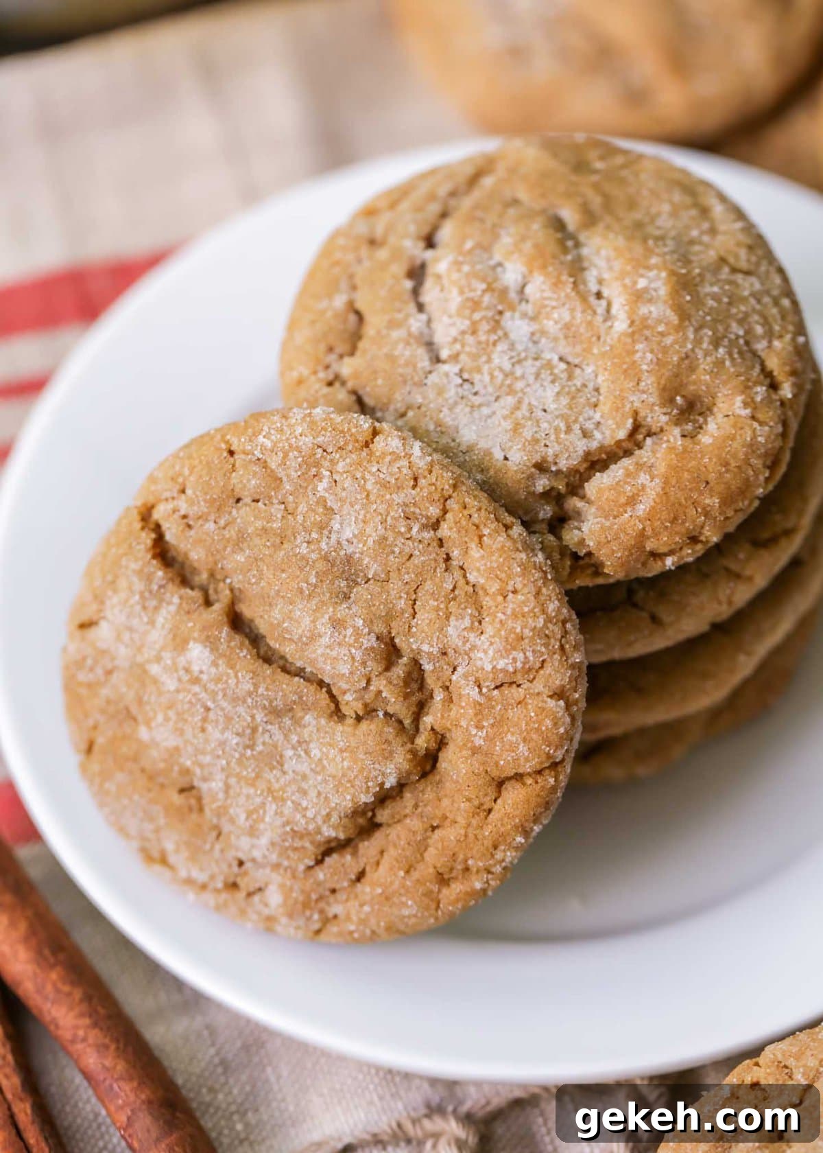 Stack of soft ginger cookies on a plate.