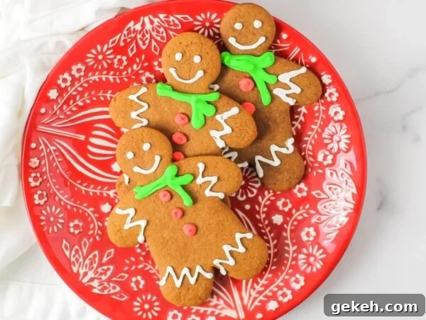 Decorated gingerbread cookies on a plate.