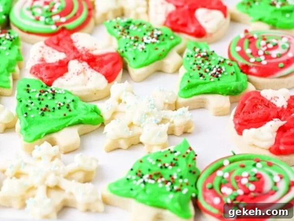 Christmas sugar cookies on parchment.