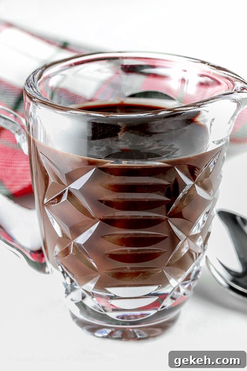 Pitcher of hot fudge sauce; The World's Easiest Hot Fudge Sauce © 2018 Jane Bonacci, The Heritage Cook