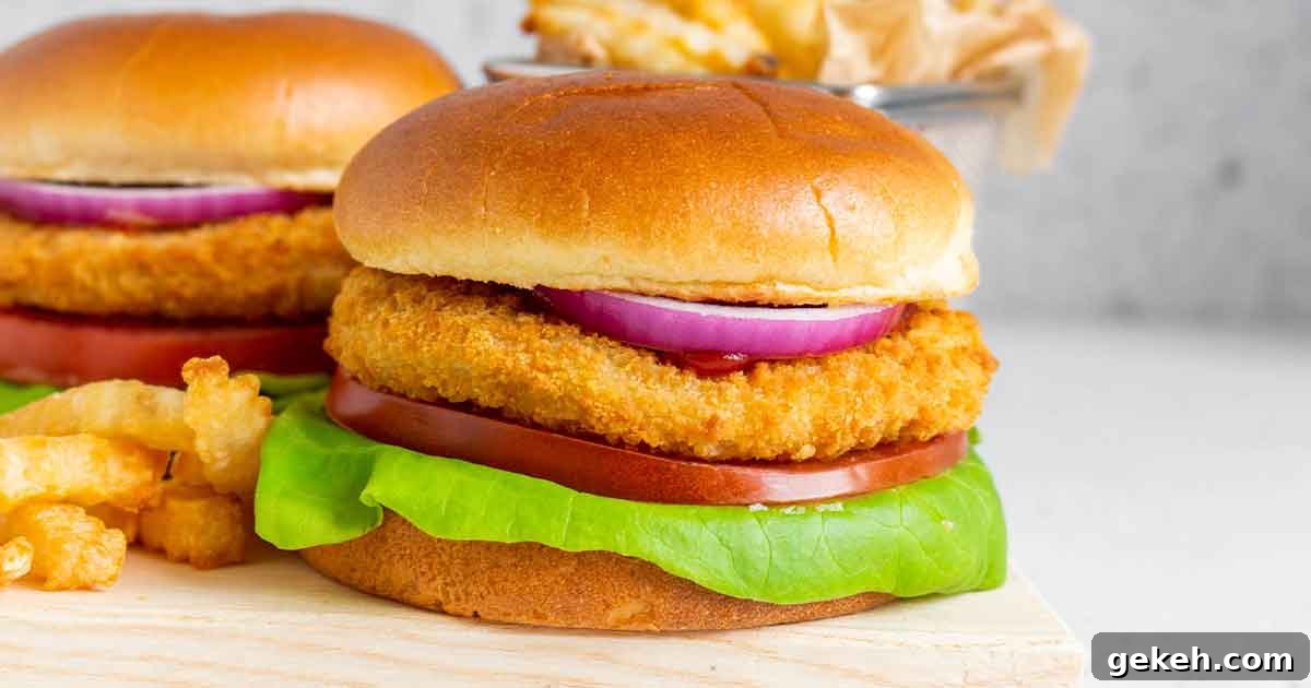 Air fryer frozen chicken patties in burger buns.