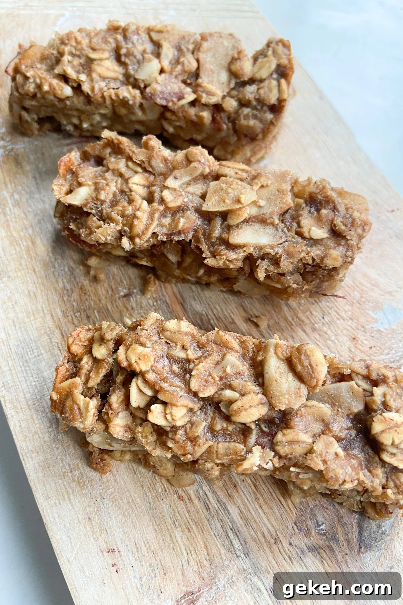 Peanut Butter Banana Granola Bars: Chewy Homemade Snack Recipe 2 Peanut butter and banana granola bars served on a wooden cutting board