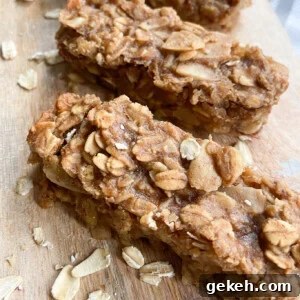 Peanut Butter Banana Granola Bars: Chewy Homemade Snack Recipe 8 Peanut butter and banana granola bars served on a wooden cutting board