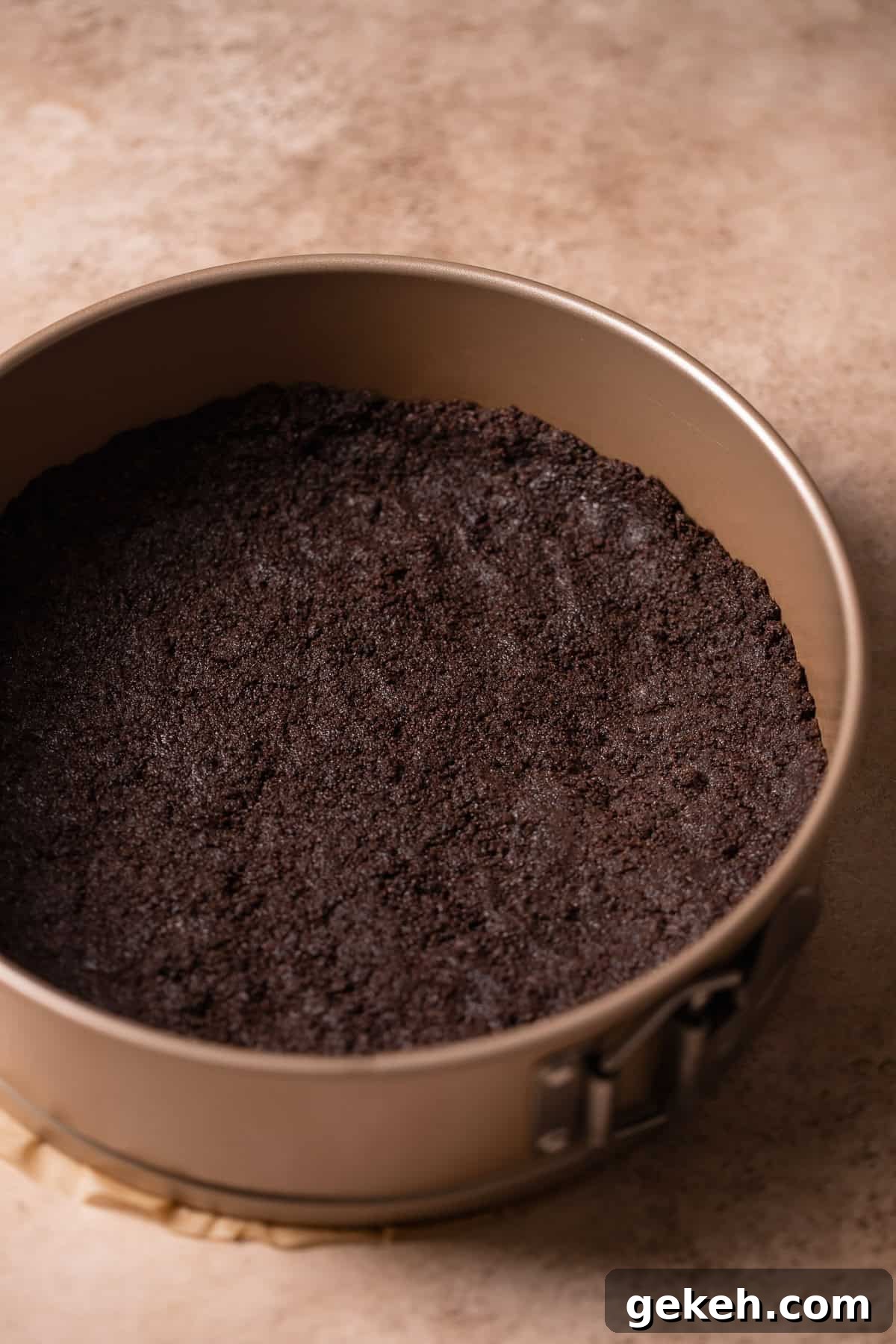 Decadent Dark Chocolate Mousse Pie Recipe for Chocolate Lovers 3 Oreo cookie crust baked into the bottom of a springform cake pan.