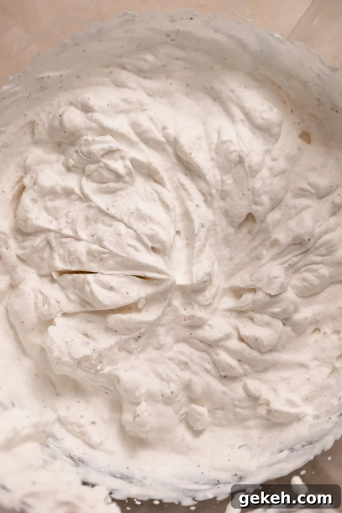 Decadent Dark Chocolate Mousse Pie Recipe for Chocolate Lovers 4 Soft whipped cream in a mixing bowl.
