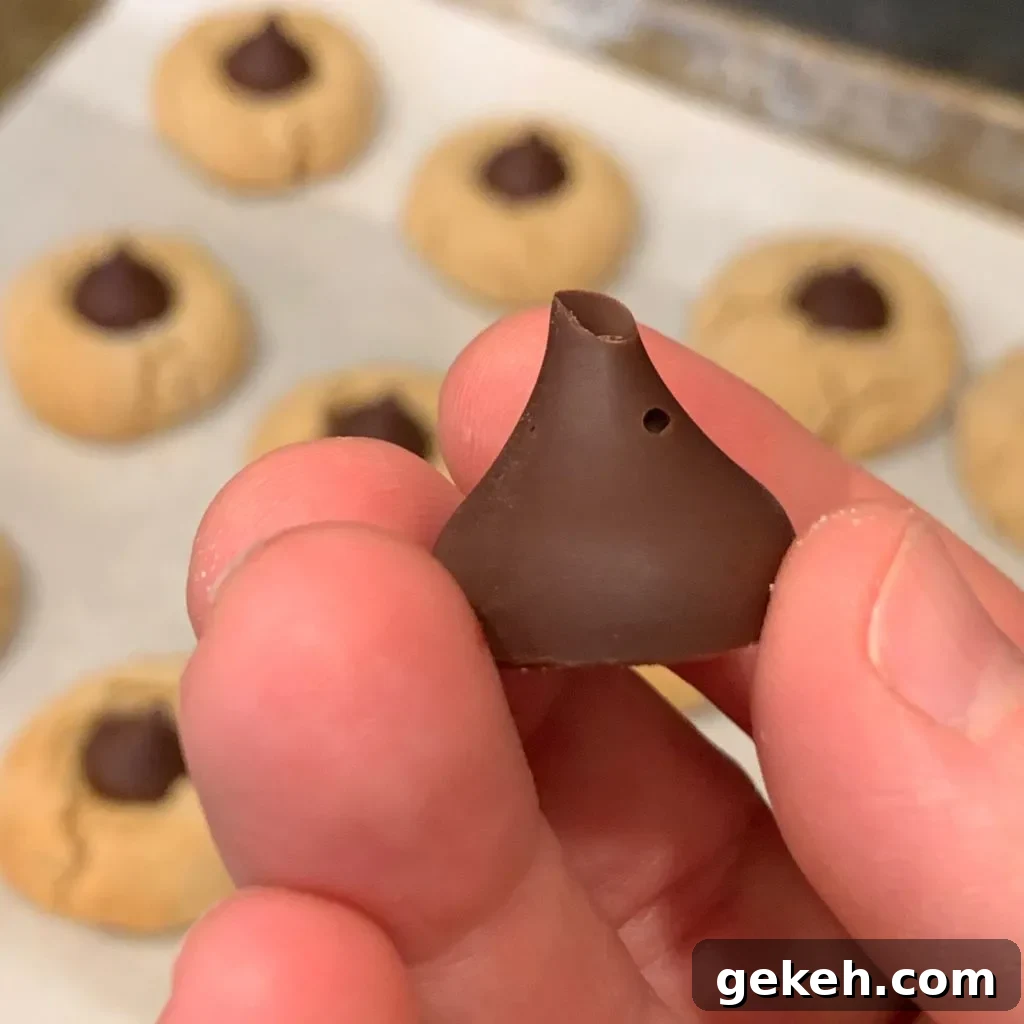 Homemade Chocolate Kisses: Simple Recipe for Melt-in-Your-Mouth Treats 6 a chocolate kiss with a hole and missing tip