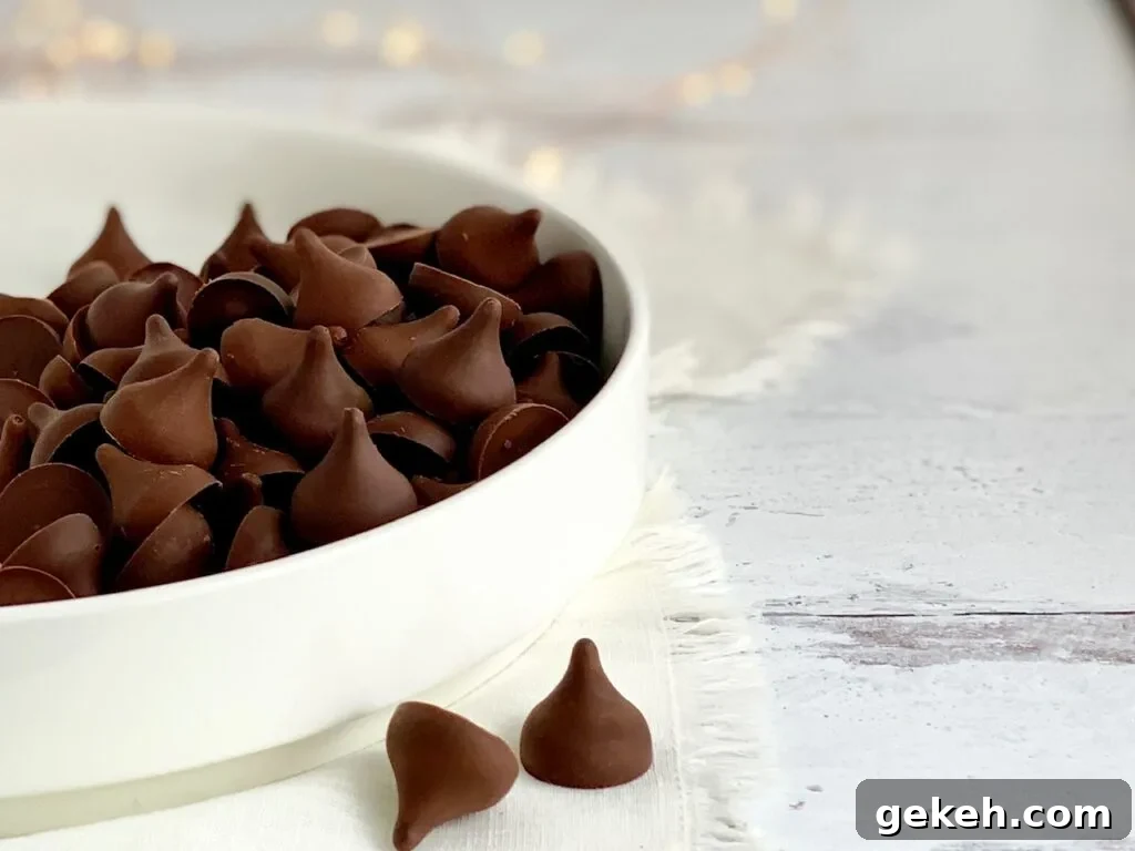 Homemade Chocolate Kisses: Simple Recipe for Melt-in-Your-Mouth Treats 10 A large white serving platter filled with chocolate kisses