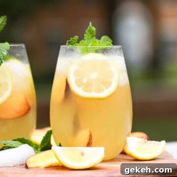White wine spritzer on table.