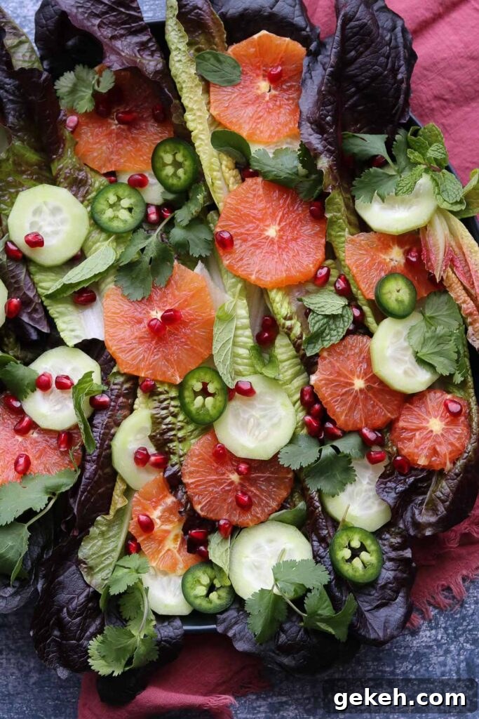 Winter Citrus Salad on plate with burgundy napkin