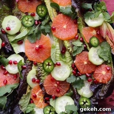 Winter Citrus Salad on plate with burgundy napkin