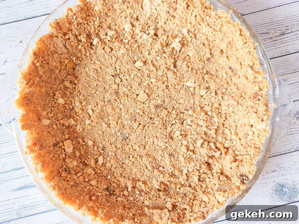 Pressing crust into pan