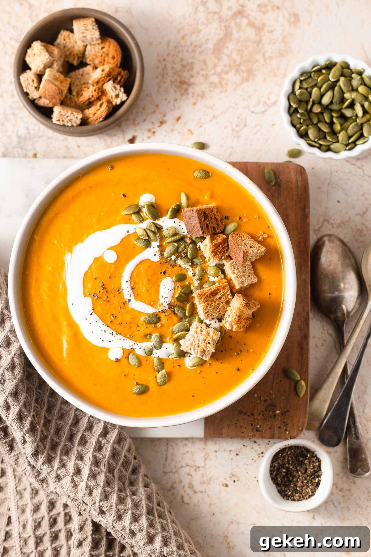 Creamy Low-Carb Keto Pumpkin Soup Recipe 3 keto pumpkin soup with croutons, pepitas