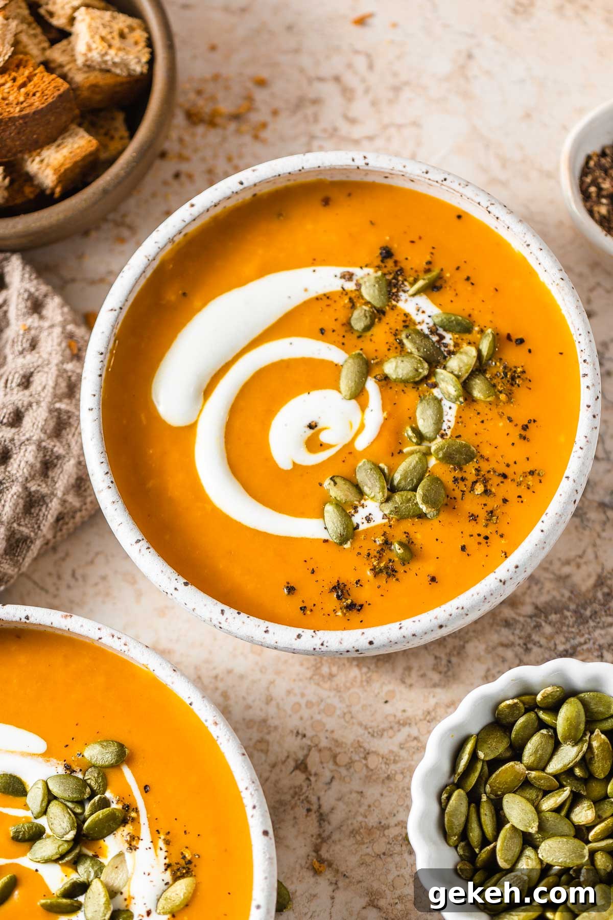Creamy Low-Carb Keto Pumpkin Soup Recipe 4 keto pumpkin soup with pepitas, croutons and cream