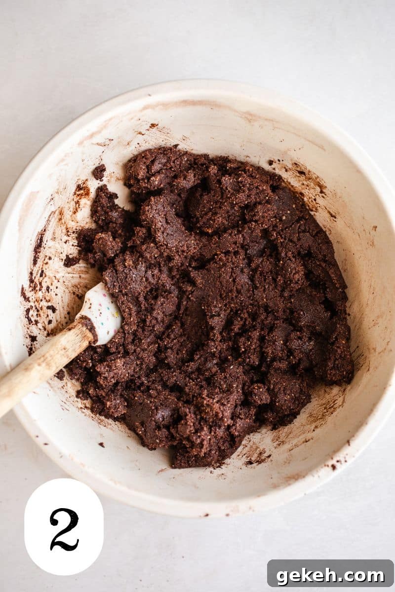 Gluten-Free Chocolate Blossom Cookies Recipe for Perfect Bakes 5 Chocolate cookie dough in a bowl.