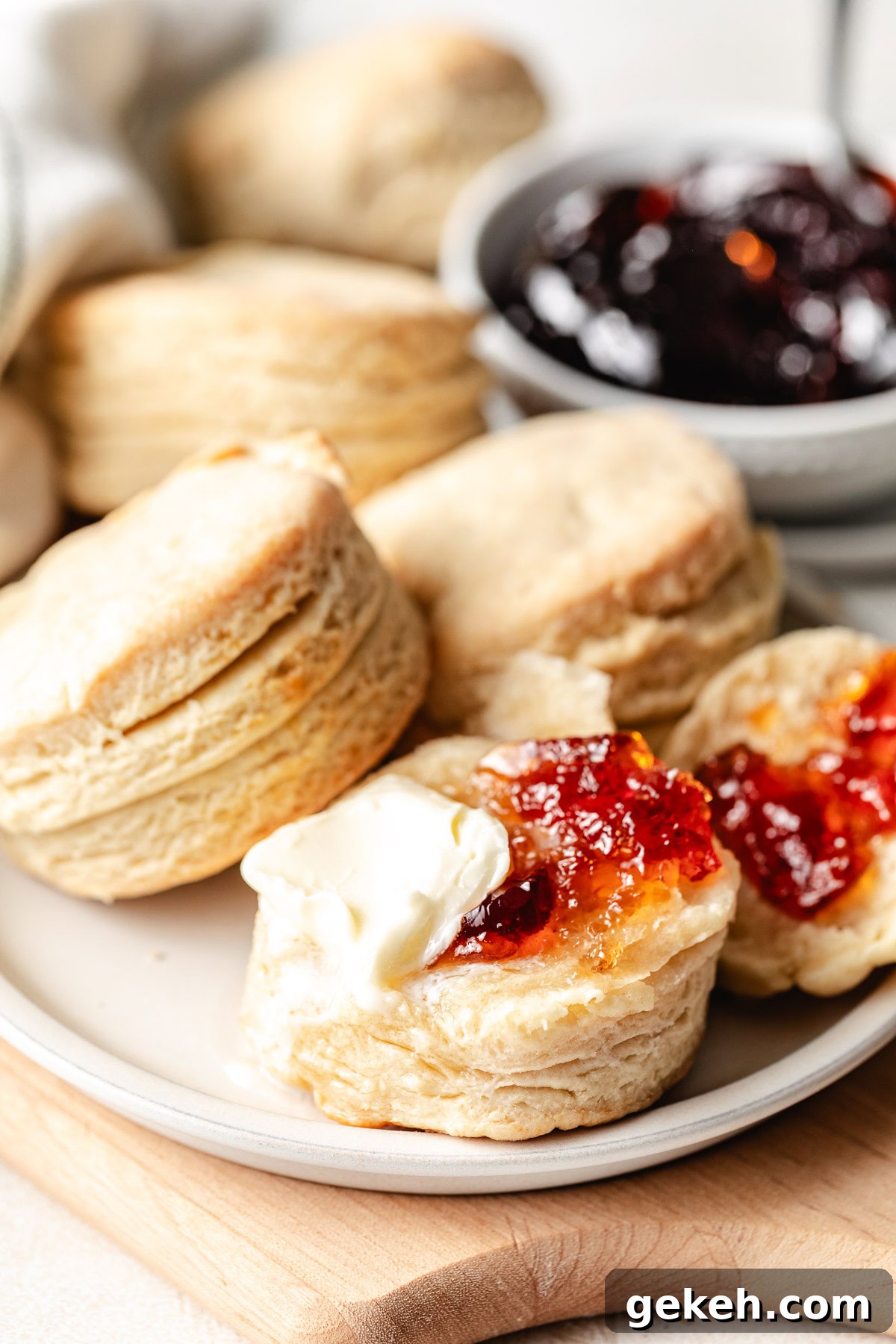Perfectly Flaky Homemade Biscuits Recipe 9 Biscuits on a plate.