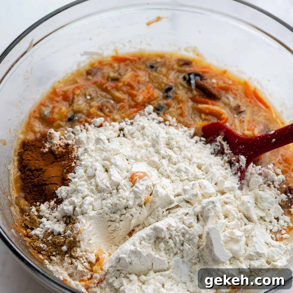 the dry ingredients being mixed into the bowl.
