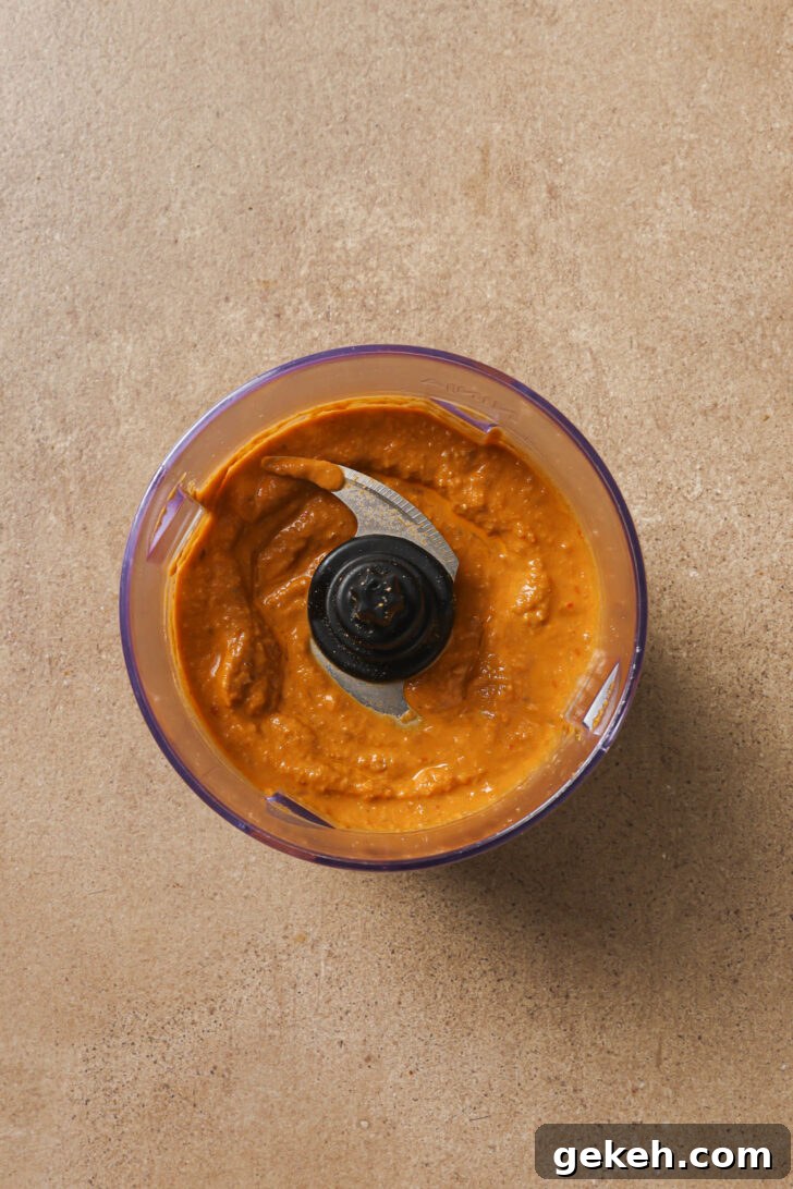 Bagara Baingan: Authentic South Indian Eggplant Curry Recipe 12 Ground spice powders, nut/seed mixture, tomato sauce, and water blended into a paste.