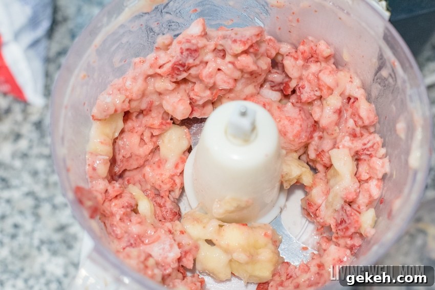Blending the strawberry banana mixture