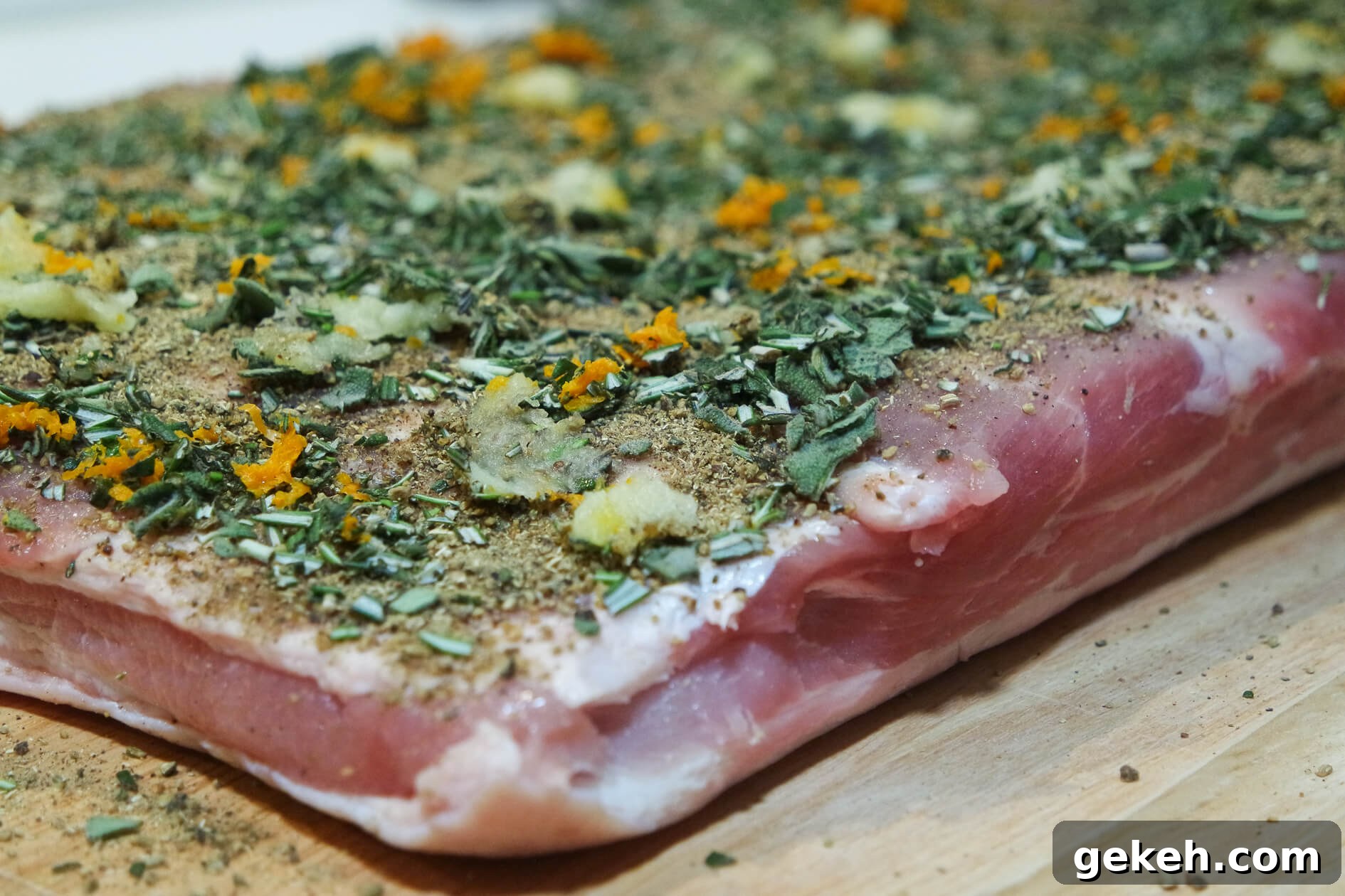 Crispy-Skinned Pork Belly Porchetta Recipe 3 herbs and garlic porchetta layer