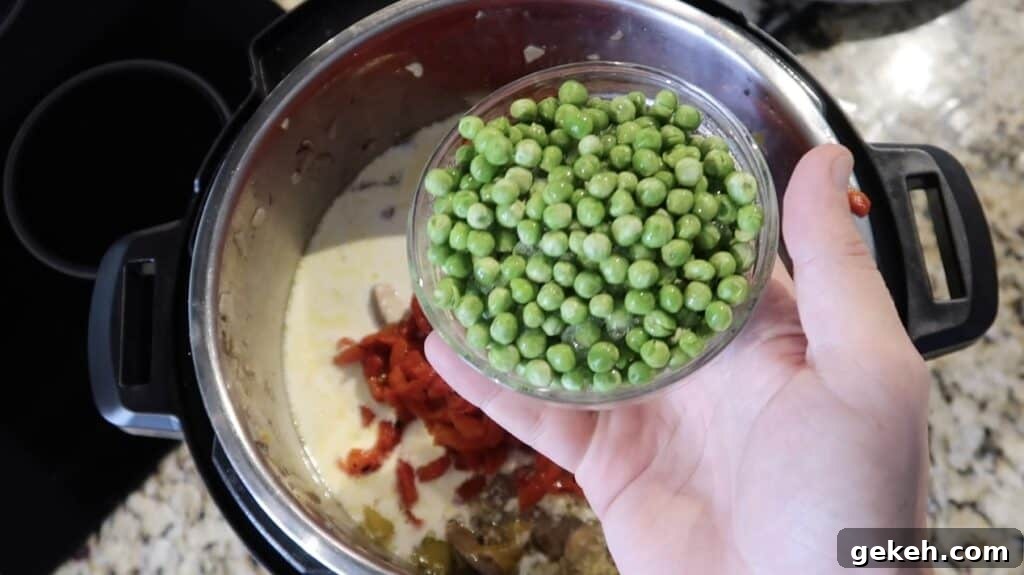 Adding frozen peas to pot