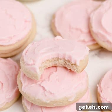 Soft Cream Cheese Sugar Cookies Recipe | Tender & Buttery 7 soft cream cheese sugar cookies with pink frosting