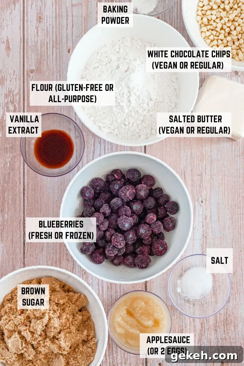 Gluten-Free Vegan Blueberry Blondies Recipe 3 Golden blueberry blondies loaded with white chocolate chips and cut into squares.