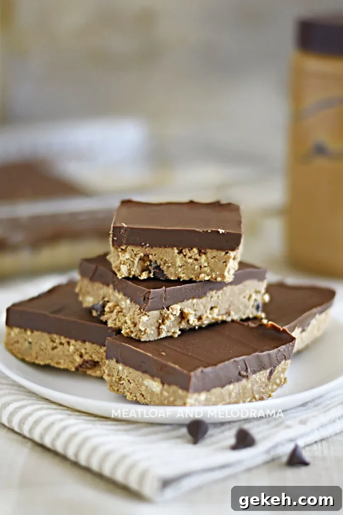stack of no bake peanut butter chocolate chip bars on plate