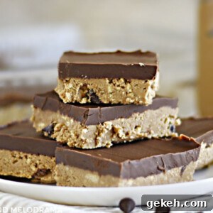 no bake chocolate peanut butter bars stacked on a white plate