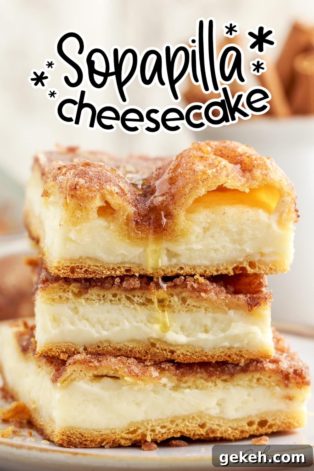 Sopapilla Cheesecake stacked on a plate with text overlay.